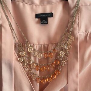 Multi-layered beaded necklace/ clear & orange